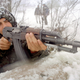 A soldier with the ethnic Albanian UCPMB, or Liberation Army of Presevo, Medvedja and Bujanovac, guards his positions on the front February 23, 2001 near the village of Shoshaj, Serbia, Yugoslavia.